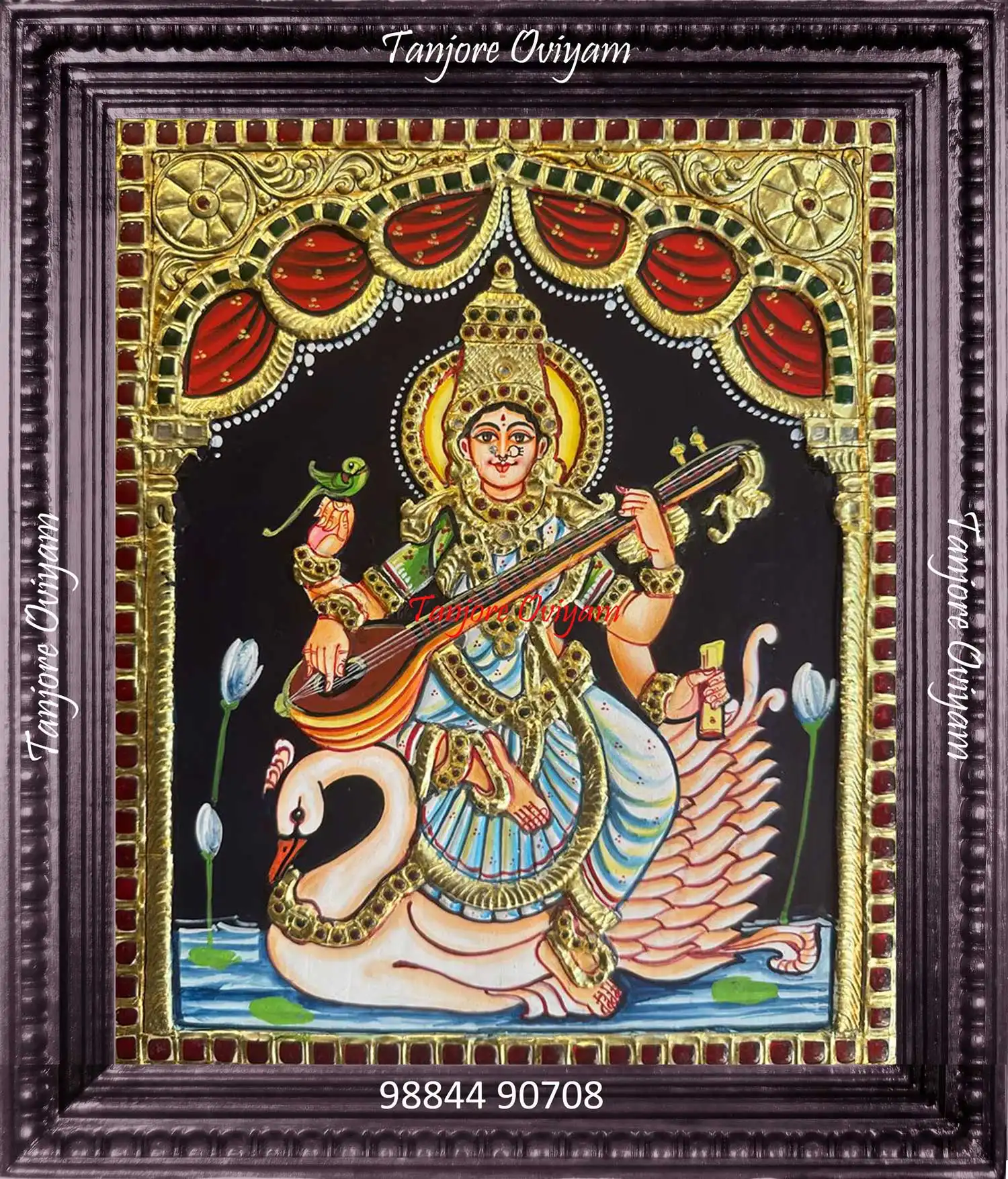 Traditional Goddess Saraswathi Tanjore painting with veena and swan, handcrafted using gold foil and embossed detailing
